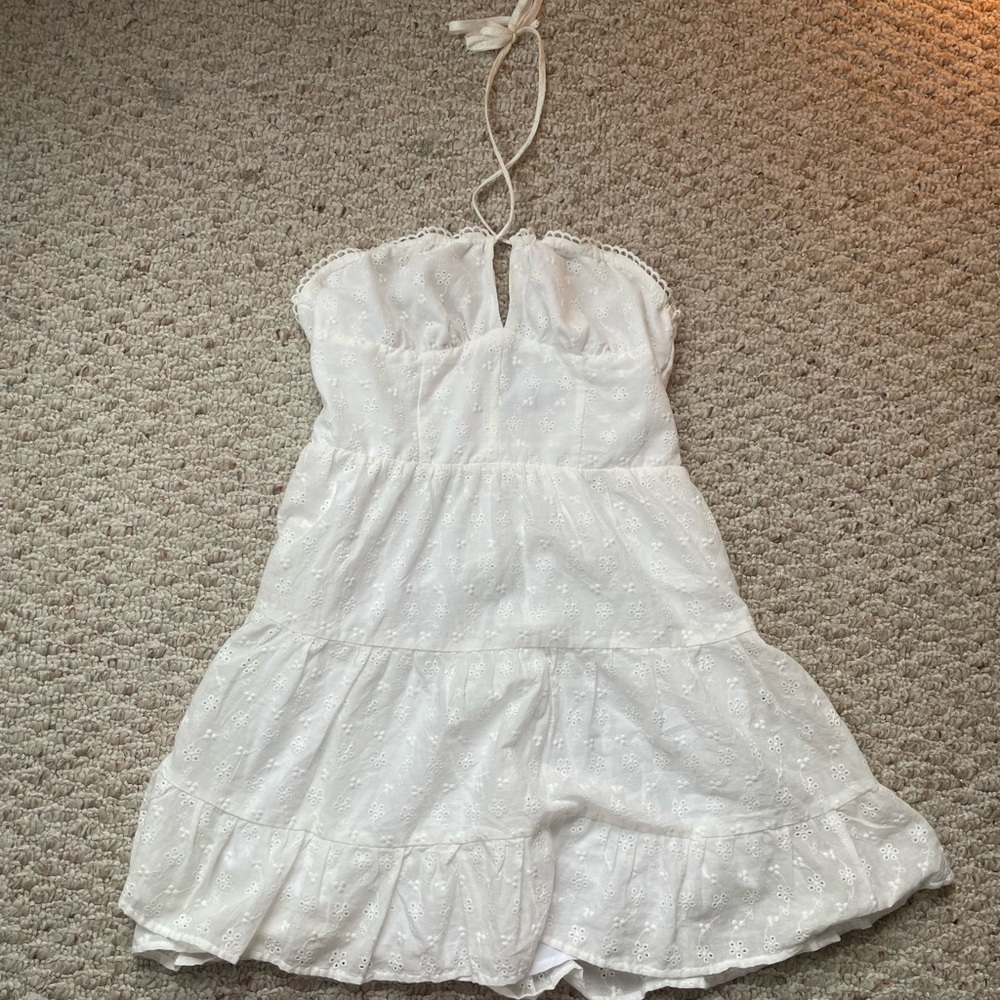 White dress with floral detailing